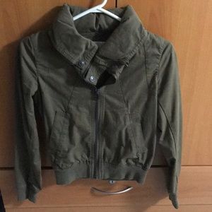 Army green bomber jacket with tucked in hood
